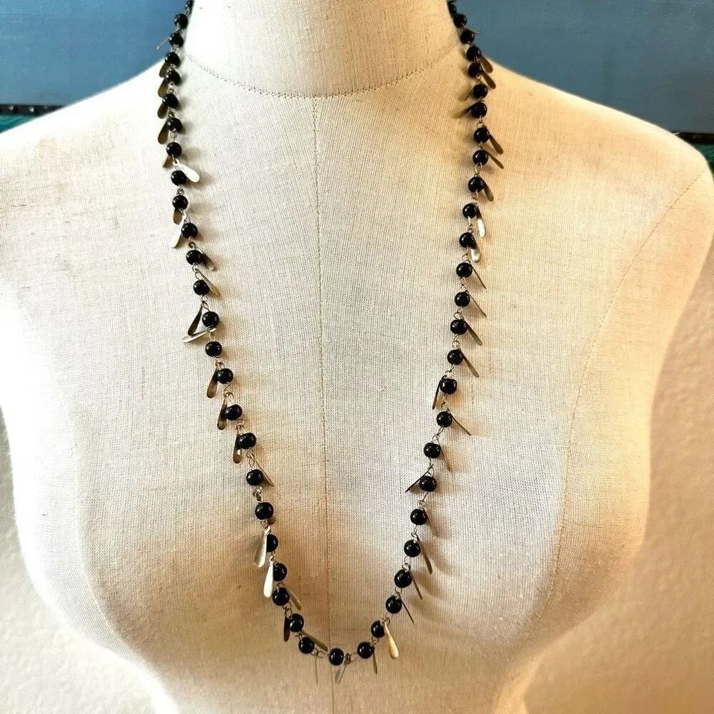 Black beaded silver tone beaded necklace